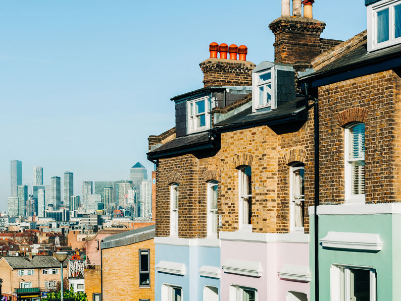Colourful London Townhouses In Greenwich, London With Canary Wharf In The Background (1)