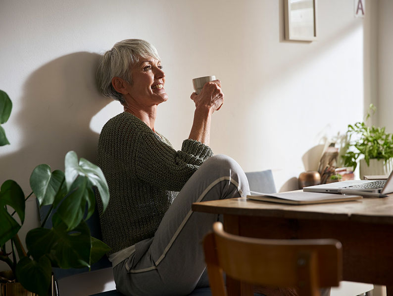 Lady Drinking Coffee From White Cup