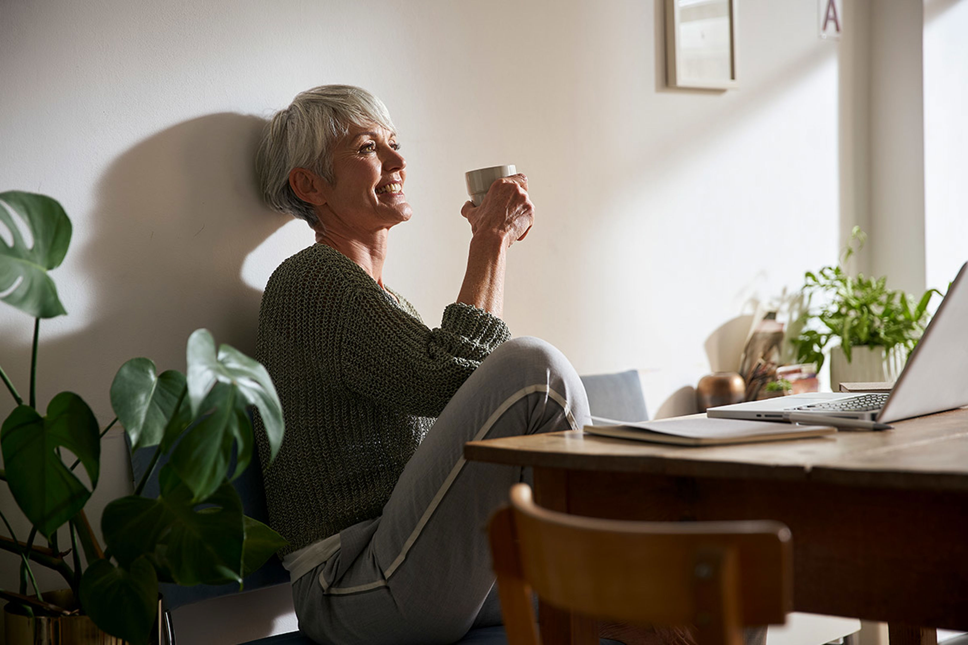 Lady Drinking Coffee From White Cup
