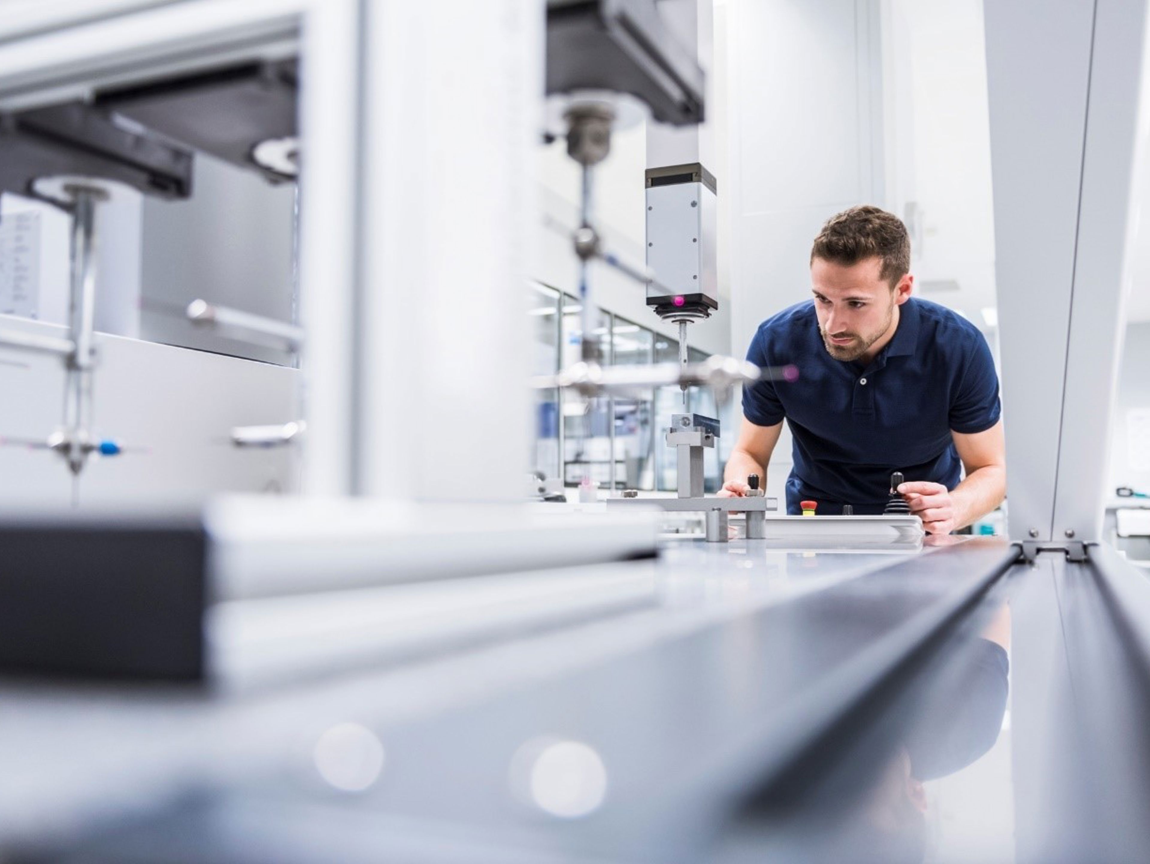 Man using machinery in lab