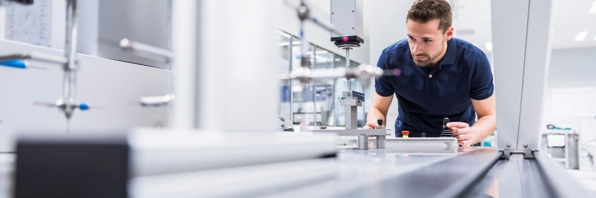 Man using machinery in lab