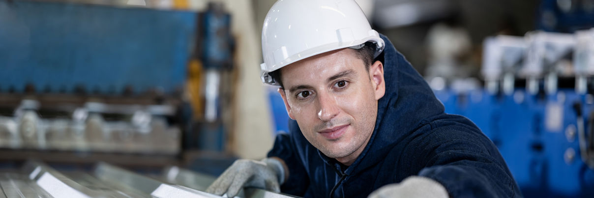 Quality Control Engineer Examines The Surface Of The Sheet