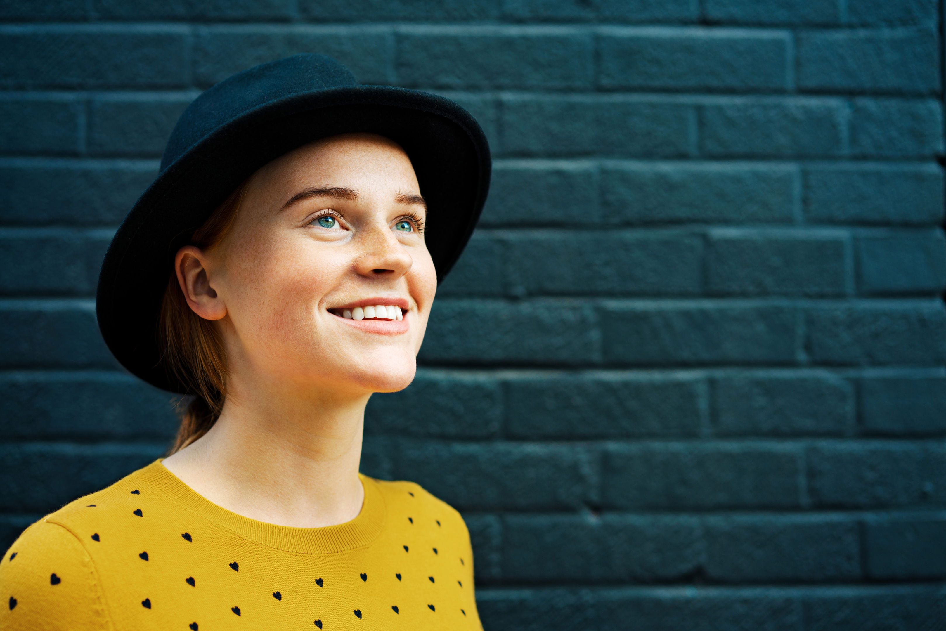 Happy Woman Looking Up And Smiling