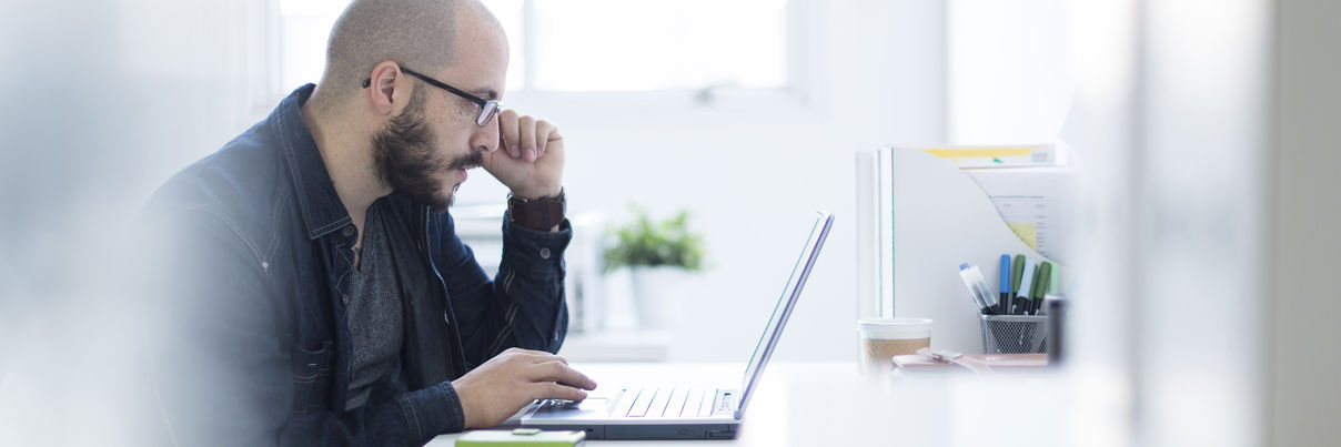 Businessman Working At Desk