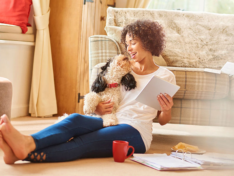 Woman With Dog And Ipad