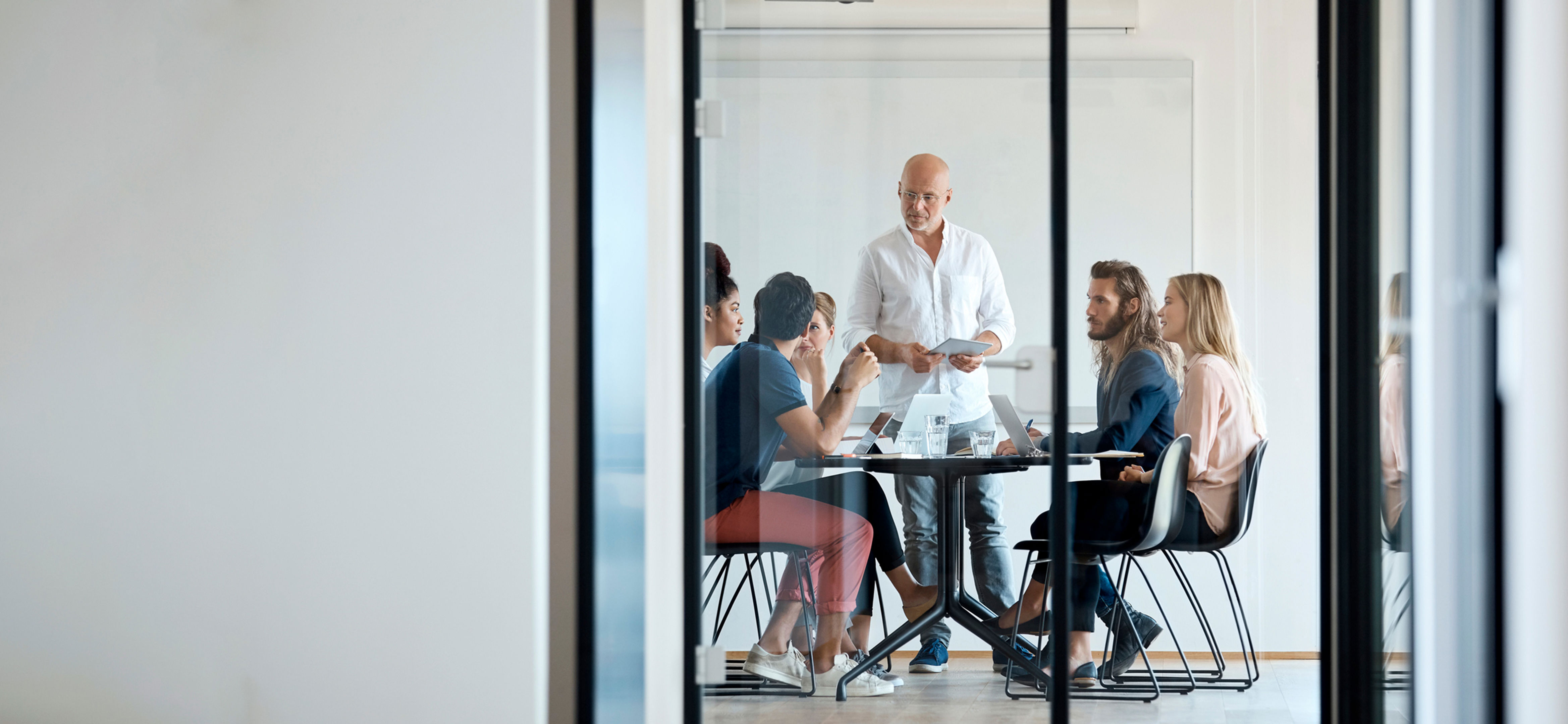 Exec Discussing Project With Colleagues