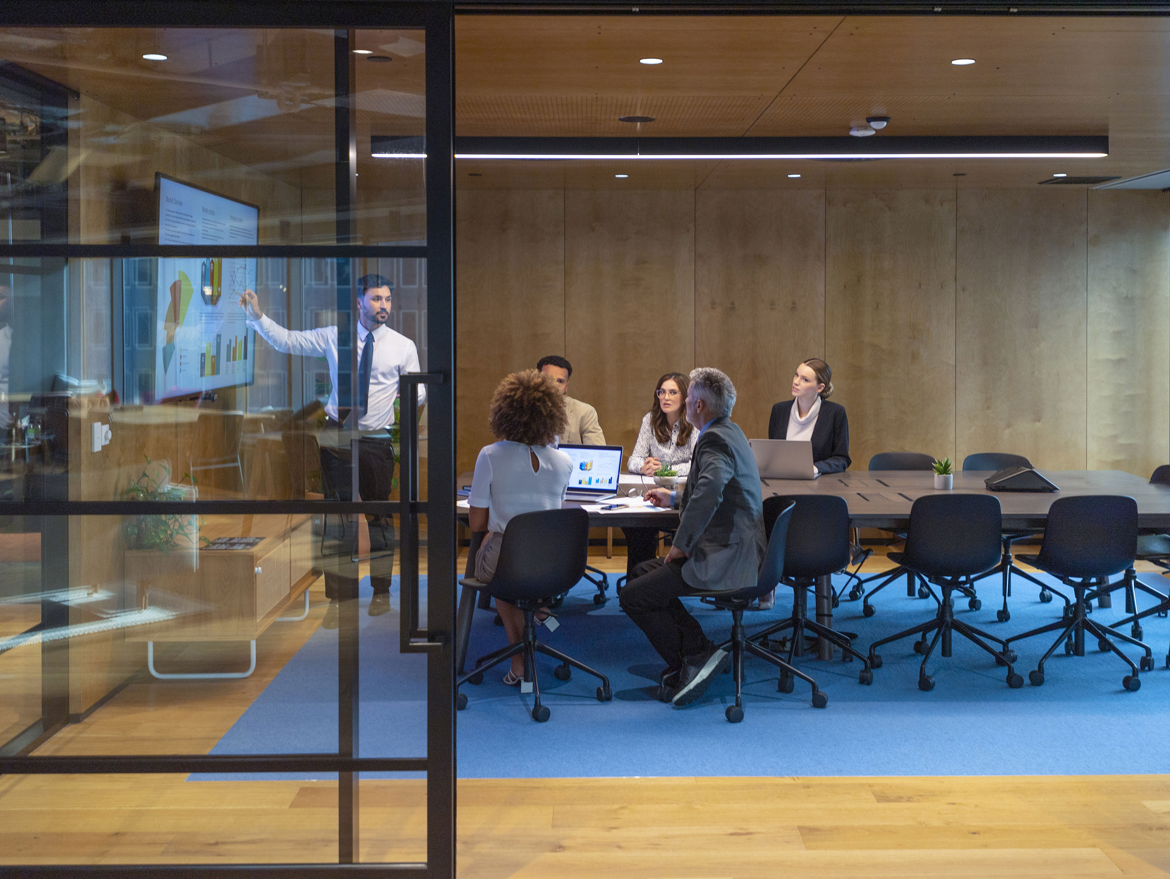 Data Presentation On A Screen In A Board Room