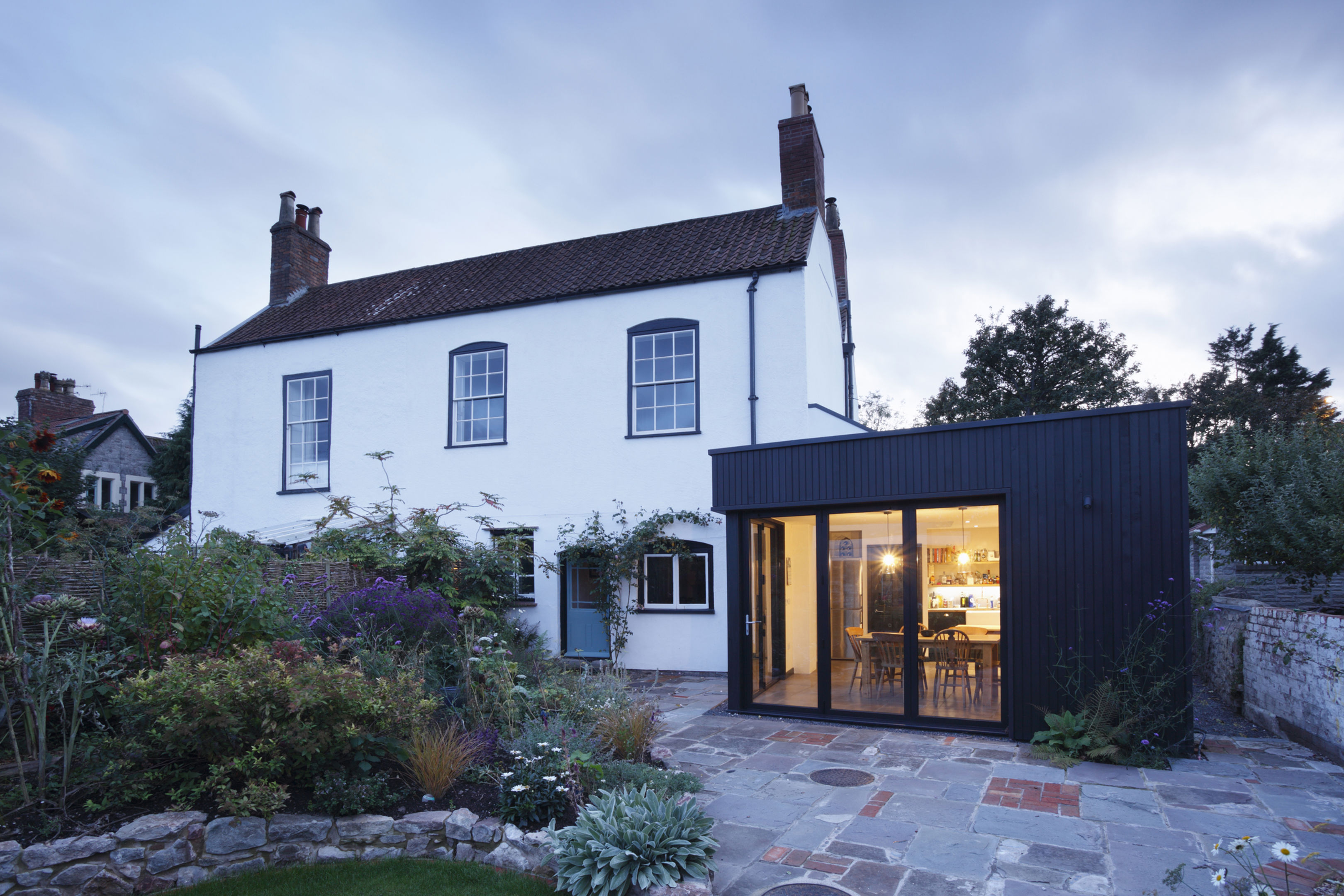 Modern extension built onto the side of a listed period property.