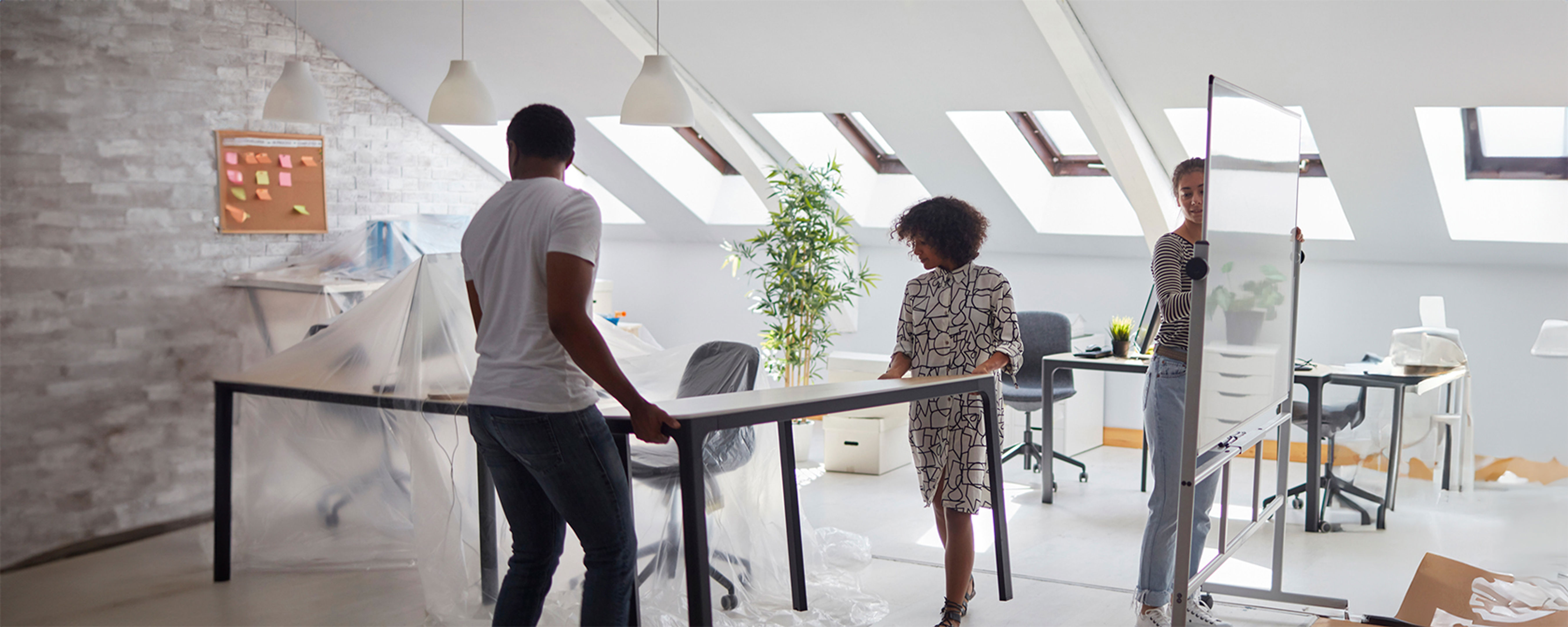 People moving office furniture